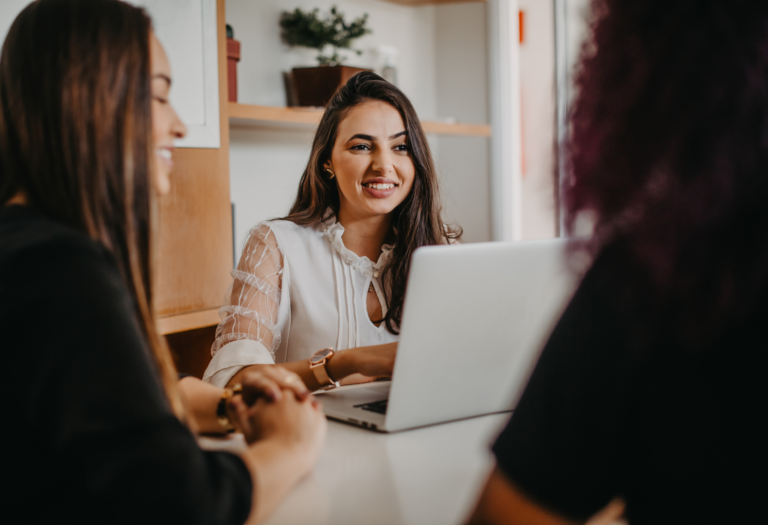 Team members working on a new content repurposing system
