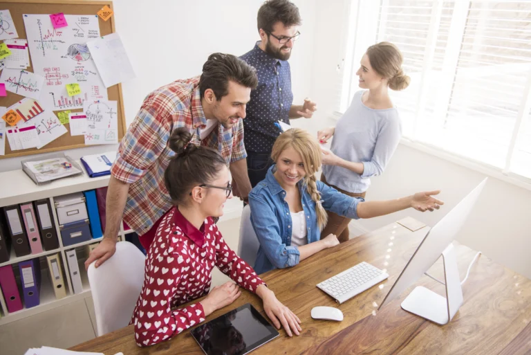 Group of marketers discussing the importance of branding